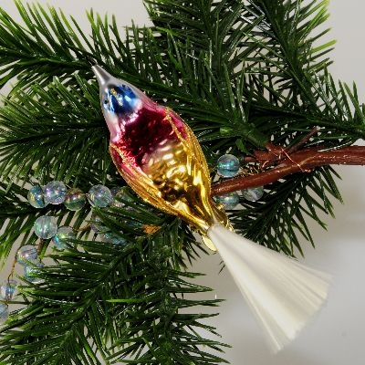 Glasvogel mit Glasschwanz, mattsilber-gold-rot,m.blauen Kopf