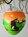 Osterei, orange, Hase mit Osternest auf Blumenwiese