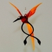 Wunders&uuml;lfe, Vogel h&auml;ngend, orange, rot, schwarz