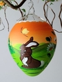 Osterei Gr&ouml;&szlig;e 12 cm,  orange, Hase mit Osternest u. Blumen