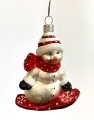 Schneemann auf Snowboard