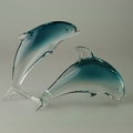 Delphinpaar groß springend und abtauchend,  kristall-türkis