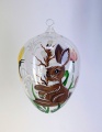 Osterei mundgeblasen mit Hase Schmetterling und Tulpen